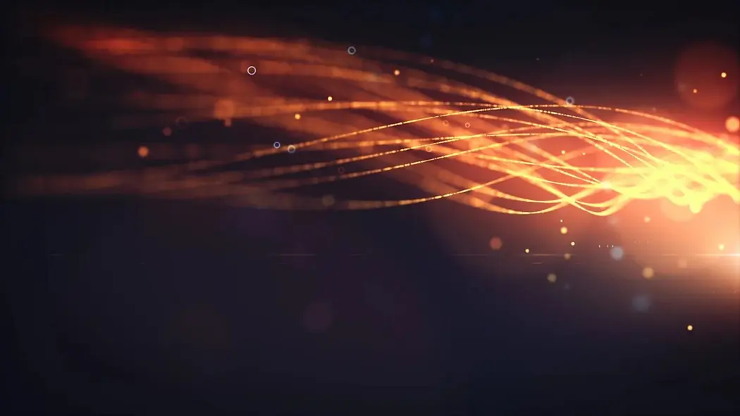 خطوط نورانی نارنجی روشن که به‌صورت سیال در پس‌زمینه تاریک عبور می‌کنند